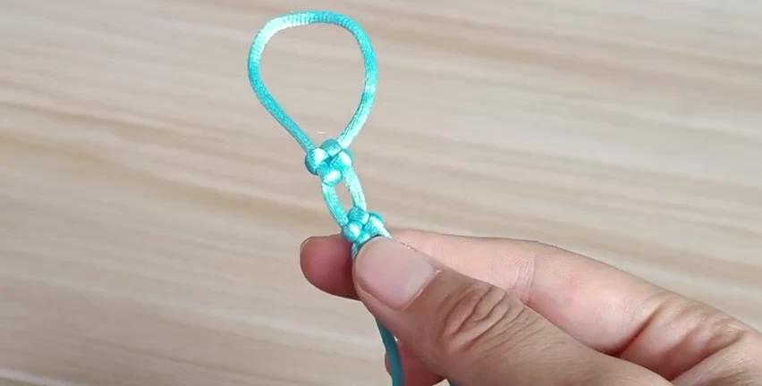 Cross Knot demonstrated with real cord