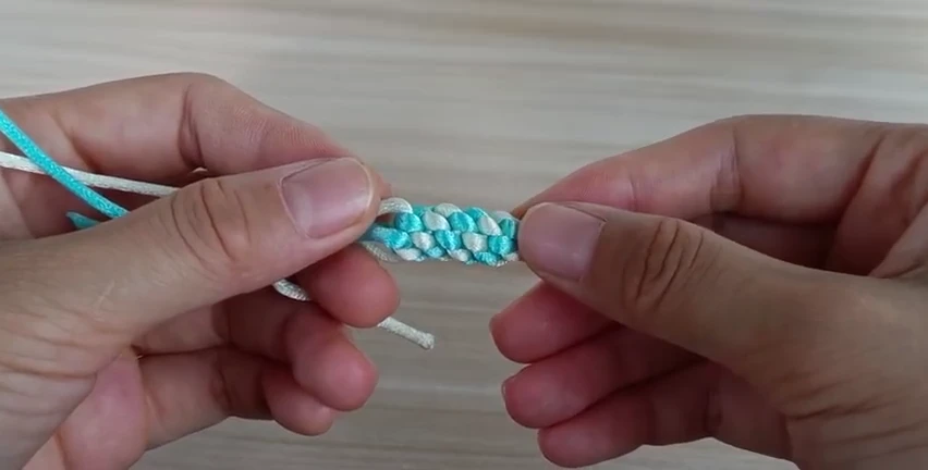 Round Cross Good Luck Knot demonstrated with real cord