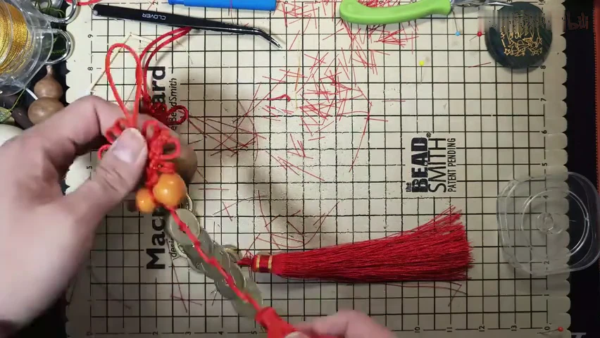 Five-Coin Hanging Ornament shown in the video tutorial